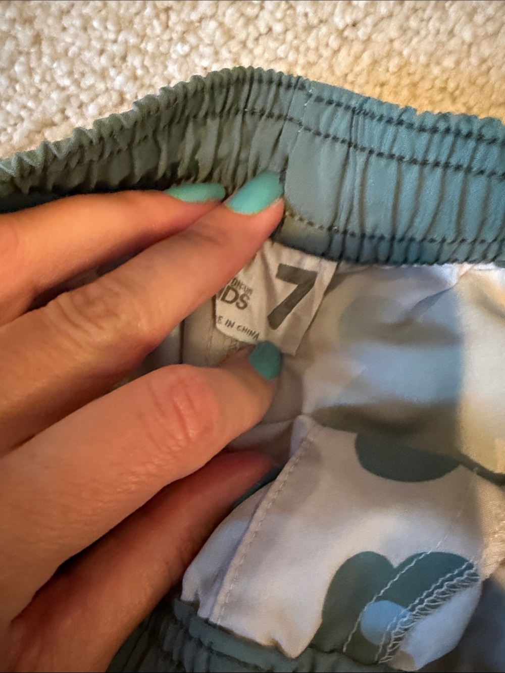 Cotton On Kids Floral Swim Trunks in Cream and Green - Picture 2 of 5